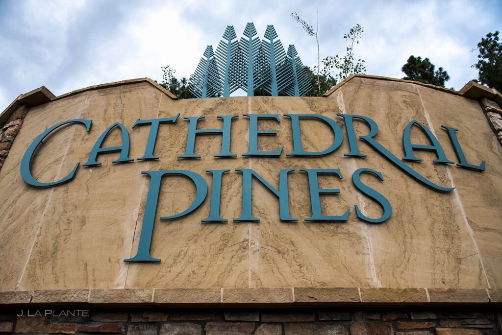 Stone sign welcoming you to Cathedral Pines