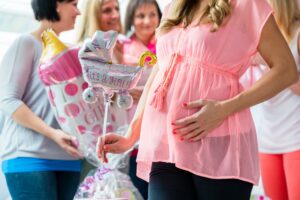 Pregnant girl celebrating at a baby shower venue in Colorado Springs