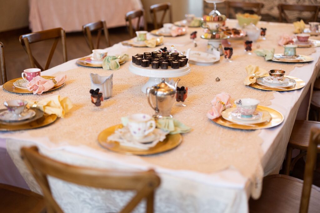 Table settings for a kids tea party at The Lodge at Cathedral Pines 