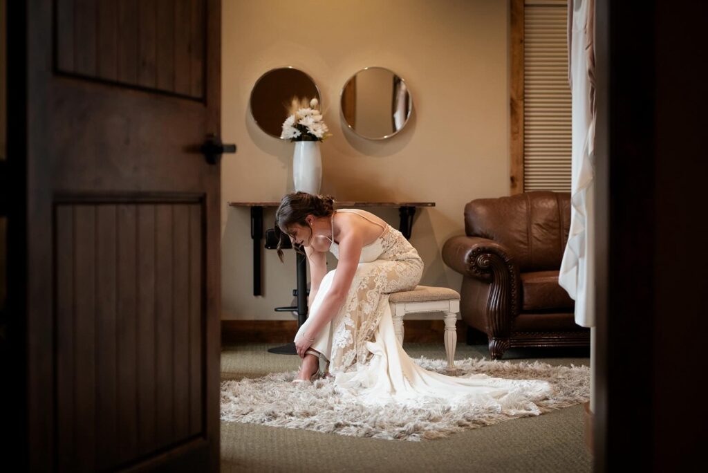 Bride Getting ready for wedding at The Lodge at Cathedral Pines