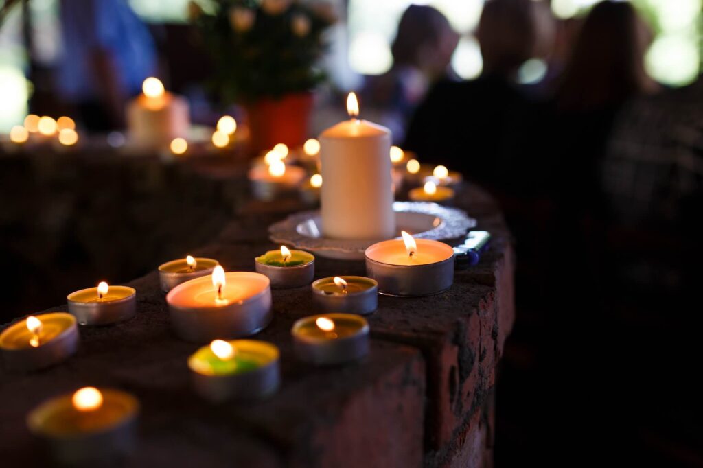 Candles and people at a celebration of life venue Colorado Springs