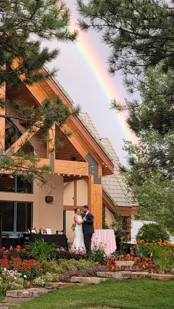Rainbow after rain at a wedding at The Lodge at Cathedral Pines