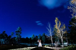 Wedding photography in the evening at a Colorado forest venue