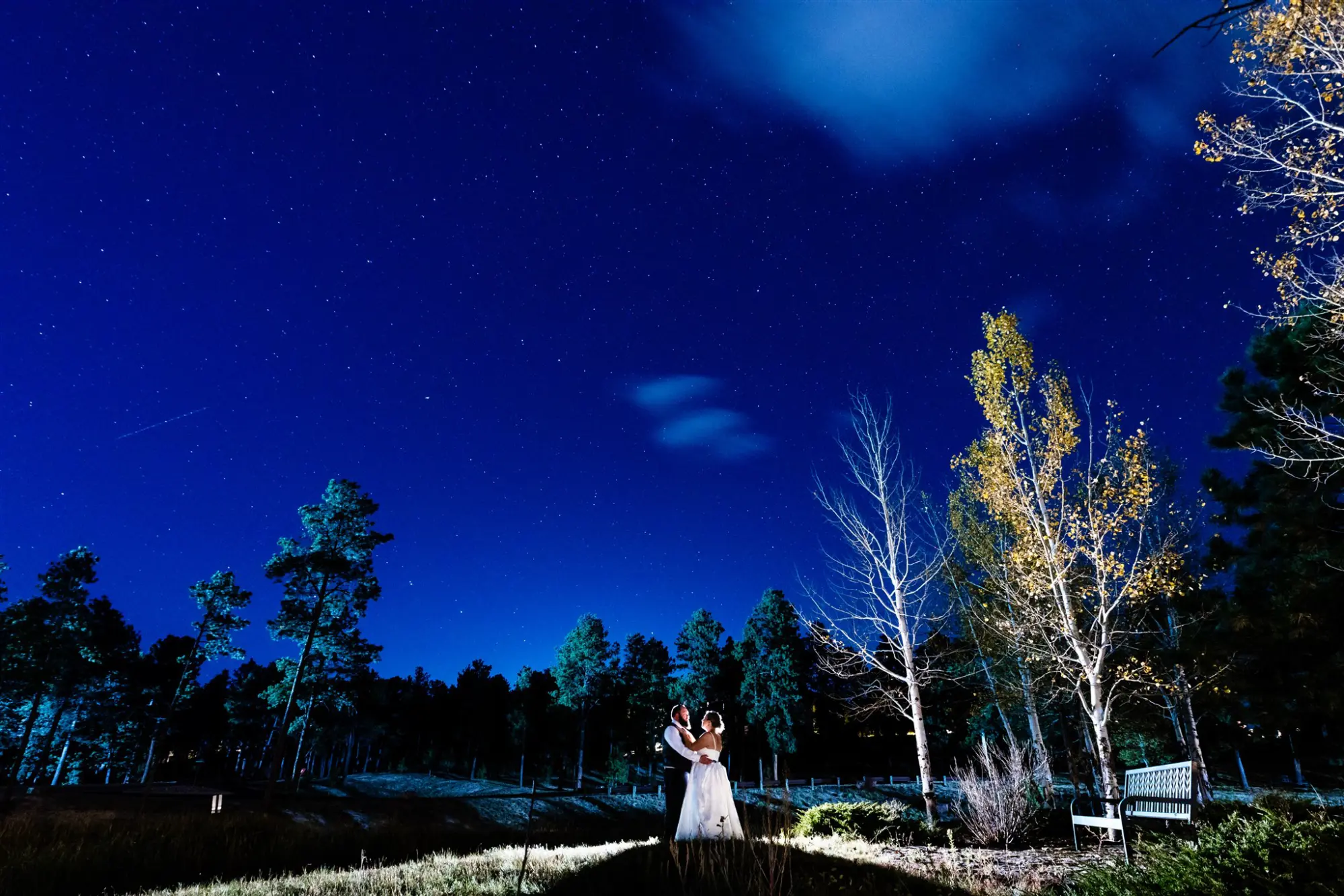Wedding photography in the evening at a Colorado forest venue