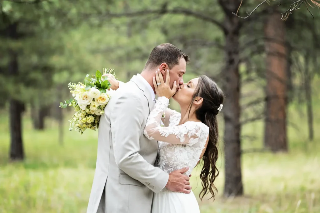 A couple kissing after being married at a Colorado Springs Wedding Venue.